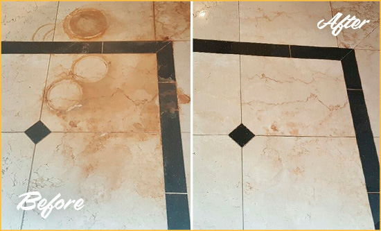 Before and After Picture of a Scotts Hard Surface Restoration Service on a Marble Floor to Eliminate Rust Stains